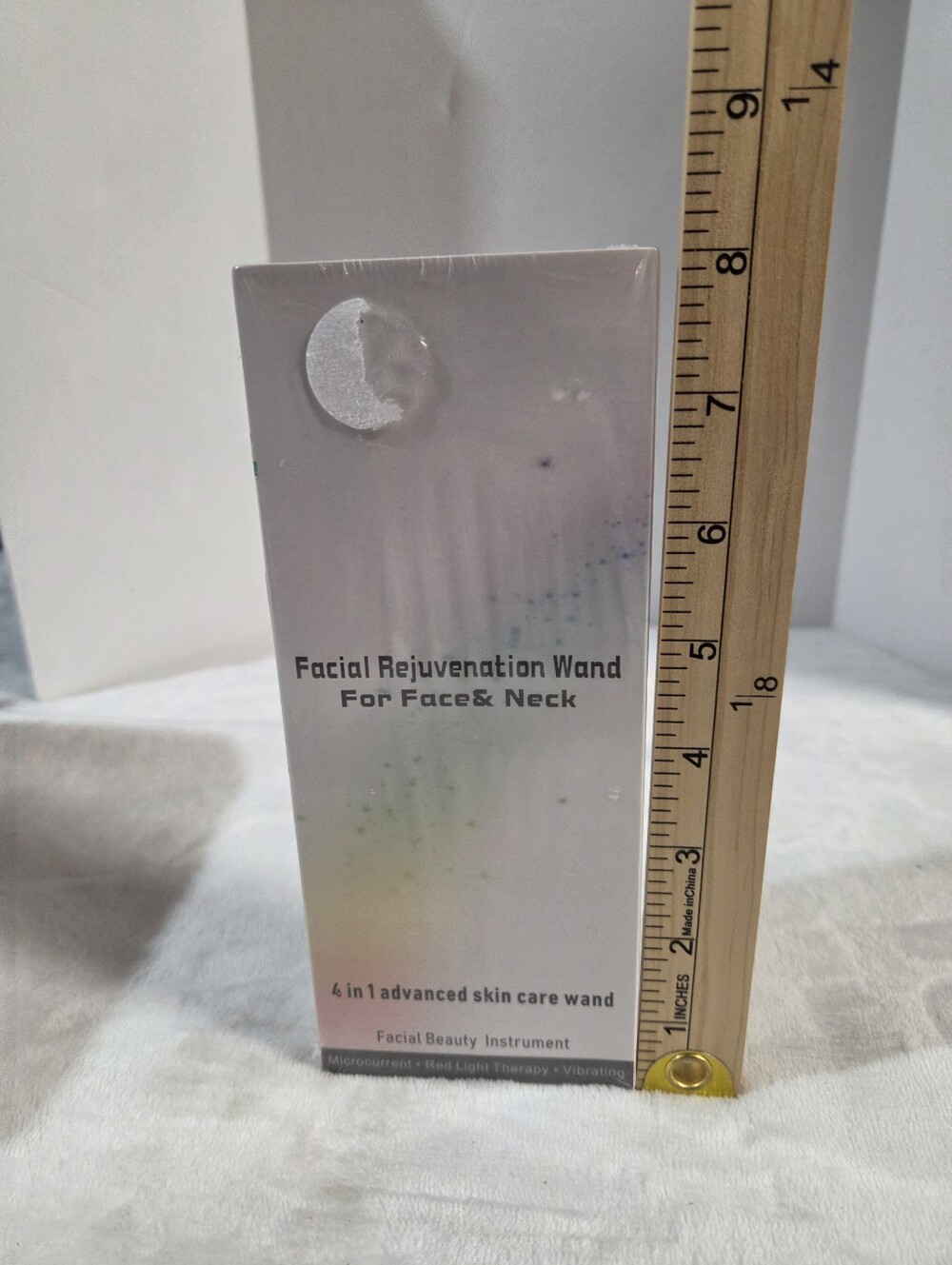 Facial Rejuvenation Wand - White with Subtle Pastel Accents